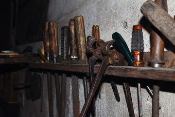 Vintage Rusted and Worn Tools In a Workshop