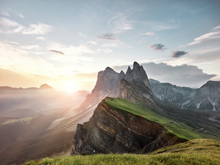 View of Seceda mountain against cloudy sky