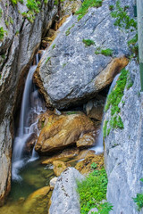 a waterfall between the rocks