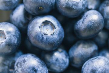 Close up of fresh raw blueberries. Overhead, top view or above view composition