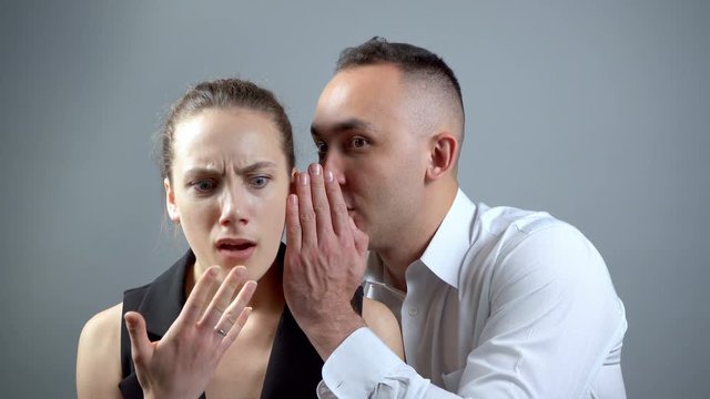 Video of two gossipers on grey background