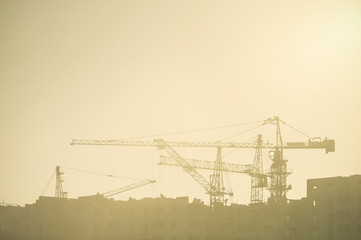 Fototapeta premium Building construction site and cranes