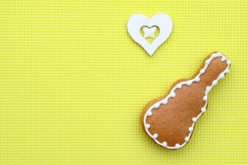 Music creative composition with gingerbread guitar on bright yellow background, copy space for text
