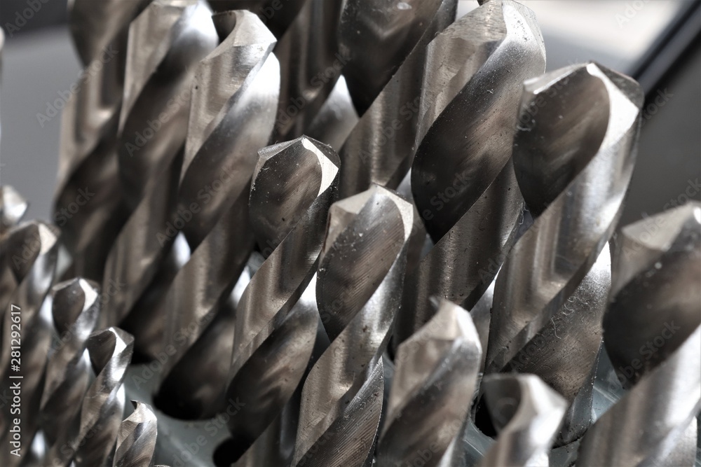 Wall mural close up of a metal drill bit set.for hard metals such as stainless steel, it's best to use drill bi