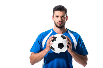 handsome soccer player with ball looking at camera Isolated On White