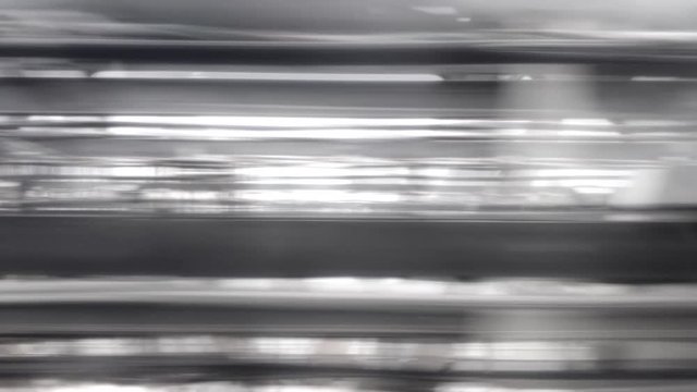 Underground train riding in a tunnel. interior view of the window of subway car on fast speed