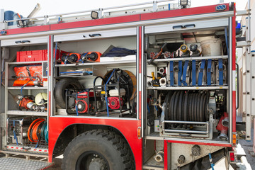 Part of equipment of a firetruck: hoses and syringe of a water cannon