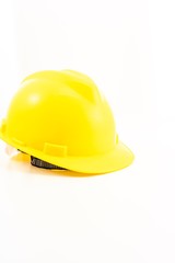 Fototapeta premium Yellow Safety helmet isolated against white background, copyspace