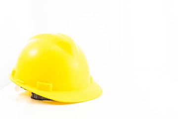 Fototapeta premium Yellow Safety helmet isolated against white background, copyspace