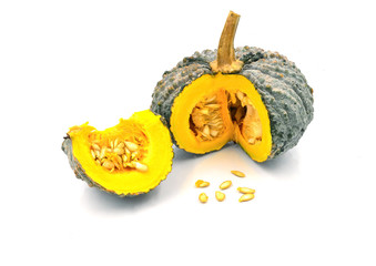 fresh yellow pumpkin and seeds cut of part prepare for cooking isoated white background