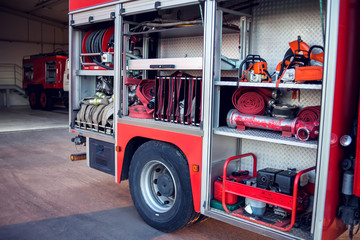 Fire engine with equipment in the fire department and ready for challenge