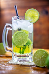 Beer caipirinha. Brazilian exotic drink of beer with lemon and cachaça.