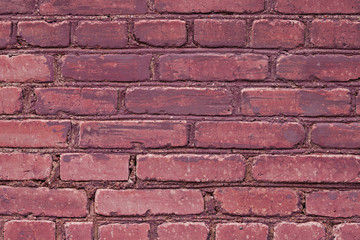 The texture of the old wall of red bricks
