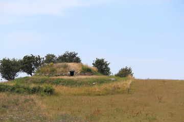 Fototapeta na wymiar View of the neolithic Hulbjerg Passage Grave near Bagenkop, Langeland, Denmark.