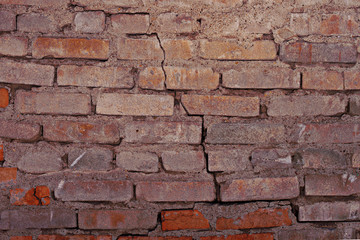 The texture of the old wall of red bricks