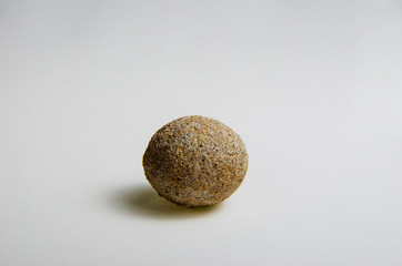 stone egg on white background
