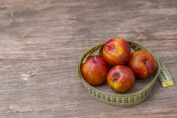 Ripe juicy plum to maintain a beautiful and slim figure, plum diet.