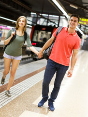 Couple is standing on platform