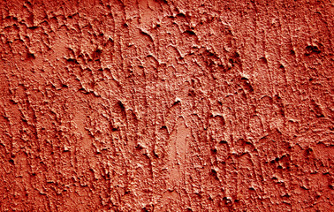 textured background with space for text. Texture rough plaster on the wall of concrete. Red
