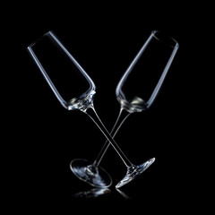 Set of empty luxury champagne glasse isolated on a black background