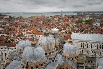 Fototapeta na wymiar View of rooftops of Venice, Italy. Can see the Basilica San Marco's rooftop