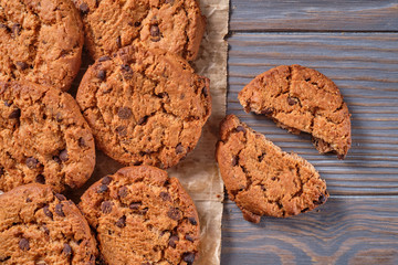 Chocolate oatmeal chip cookies on the rustic wooden table. Flat lay