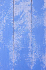 Vintage light blue wood background texture with knots . Old painted wood. Blue abstract background.