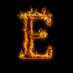 Letter E. Fire flames on black isolated background, realistick fire effect with sparks. Part of...