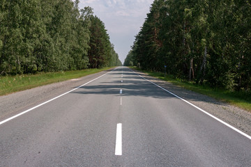 Fototapeta na wymiar flat asphalt road for cars with markings