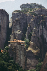 Obraz premium View of the Holy Monastery of Roussanou. Meteora monasteries. Kalambaka. Greece. UNESCO World Heritage List. Vintage effect.