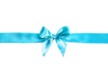 Blue bow isolated on white background. Silk ribbon, silk bow.