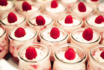 Individual cups of fruity mousse with cream
