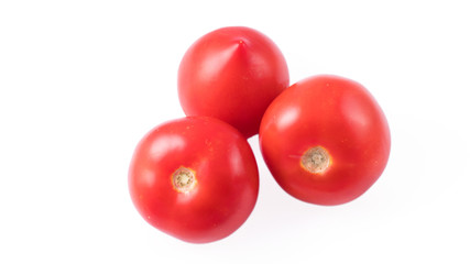 three tomatoes on a white background