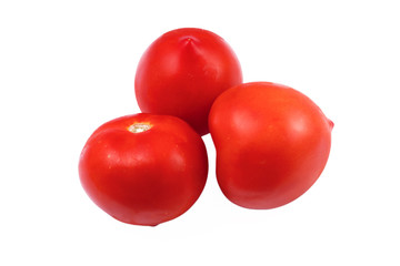 three tomatoes on a white background