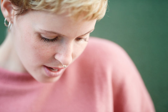 Blonde girl with septum in close-up.