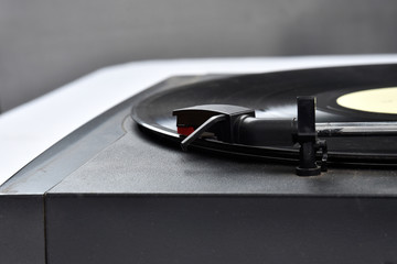 old vinyl record player on white background