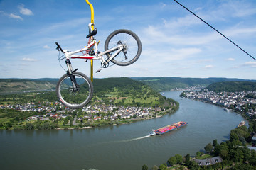A bicycle going up on a chair lift in Boppard, Germany.