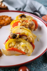 Vegetarian food. Close-up Stewed potatoes with zucchini, carrots, mushrooms and cheese