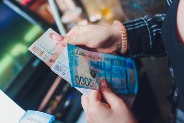 Russian rubles in the hands of a business woman.