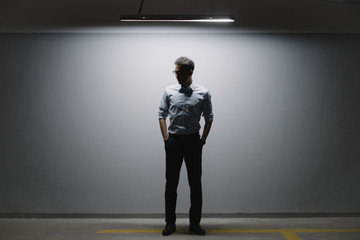 Businessman stranding indoors