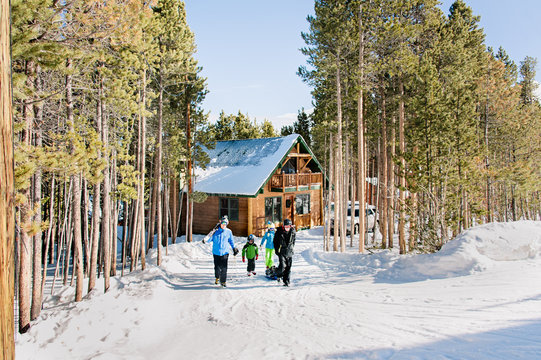 Family preparing to go skiing