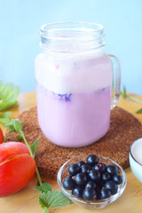 berries and milk smoothies, blue, pink, purple, coral
