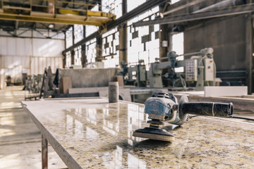 Buffing Drill on Slab of Countertop Stone