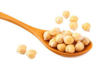 chickpeas in wooden spoon isolated on white background