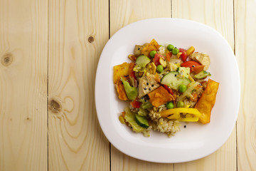Tasty healthy dinner with chicken meat, fresh vegetables and rice, close up