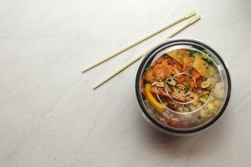 Tasty healthy dinner with chicken meat, fresh vegetables and rice, close up