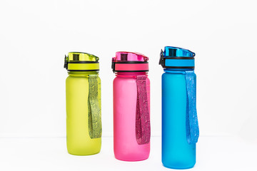 Bright plastic free reusable bottles isolated on white background. Ecology and environment protection concept.