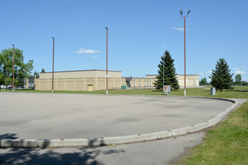 Fototapeta na wymiar Outdoor ice skating and hockey rink empty in summer.