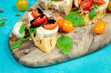 Organic Homemade Caprese Sandwich with Tomato, Mozzarella and Basil