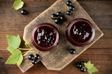 Two jars with black currant jam